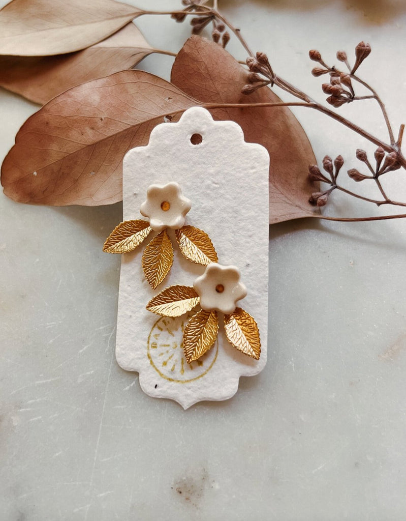 Gilded Garden: Porcelain Daisy Flower Stud with Removable Gold Leaf Jacket - Daily Magic