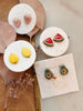 Gilded Garden: Porcelain Fruit Studs with Gold Detailing - Daily Magic